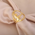 Golden gymnast hollow ring made of stainless steel displayed on elegant silk background - US 6 / Gold
