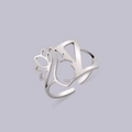 Detail of cutout portrait design and floral pattern on a silver adjustable ring - Steel Letter Z