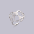 Adjustable silver cutout ring featuring minimalist face silhouette and floral design - Steel Letter G