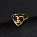 Polished golden stainless steel heart ring featuring a Celtic knot design on black display - US 7 / Gold