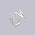 Silver adjustable stainless steel ring featuring cutout letter N and silhouette - Steel Letter M