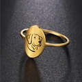 Macro detail of 18K gold plated oval ring featuring laser engraved dog head silhouette - US 7 / Gold