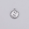 Detailed view of silver hollowed-out Tai Chi pendant with a top hanging loop for jewelry - Steel