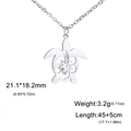 Roestvrijstalen schildpad ketting met opengewerkt hibiscus patroon op zilveren hanger - Staalkleur