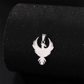 Polished silver phoenix pendant made of stainless steel displayed on a black stand - Steel