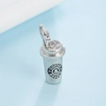 Silver coffee cup pendant with smiley face logo and lobster clasp on light blue background - Antique Silver