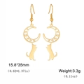 Detail shot of hollowed star and moon cat earrings in gold plated stainless steel - Gold