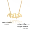 Macro shot of gold hollow bat pendant with detailed dimensions 34.8x16.1mm and weight - Gold