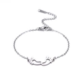 Charming stainless steel chain bracelet featuring two cute hollow footprint charms - Steel