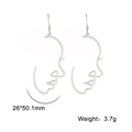 Orecchini minimalisti in argento con profilo del viso e ciglia lunghe - Oro