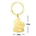 Detailed view of the gold-plated witch house keychain silhouette with 33mm height scale - Gold