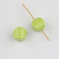 Detail showing light green acrylic square beads with a center hole for DIY jewelry - Fruit Green