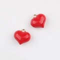 Close-up of vibrant red heart pendants with gold loops for DIY jewelry making accessories - Large / Red