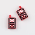Detail showing acrylic cartoon walkie-talkie beads for DIY jewelry and phone chains - Red