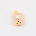 Macro detail of cartoon walkie-talkie acrylic bead with smiley face for DIY jewelry - Yellow