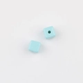 Detail of two light blue acrylic square cube beads with center holes for DIY jewelry - Sky Blue