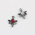 Macro view of gun black winged heart charms with red zircon and arrow for DIY jewelry - Gun Black Base Red Zirconia