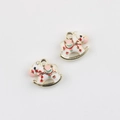 Detail of colorful enamel rocking horse pendants with gold metal frames for DIY jewelry - Gold Base White