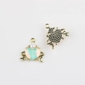 Detail of alloy heart charms with pearl and moon elements for DIY jewelry making - Gold Base Green