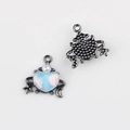 Macro detail of alloy heart pendant with pearl and moon motifs, front and back view - Gun Black Base Blue