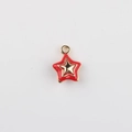 Detail showing red enamel star pendant with gold alloy trim and integrated hanging loop - Gold Base Red