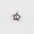 Macro view of a double-layered star pendant with brown enamel finish and silver metal - Silver Base Coffee