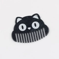 Macro view of cat-shaped acetate comb pendant with marble texture and 0.0 emoji design - Black Marble Style / Black