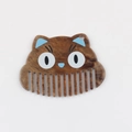 Detailed macro view of an acetate cartoon cat head comb with brown marble texture and teeth - Brown Tortoise Shell Style / Brown