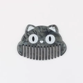 Detailed view of grey marble pattern acetate cat-shaped comb pendant with hanging hole - Gray Marble Texture Style / Gray