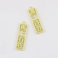 Detail of cream rectangular alloy charms with Chinese characters and hanging loops - Yellow