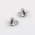 Dettaglio di ciondoli a forma di teiera in argento con zirconi blu per gioielli DIY - Argento Zirconia Blu