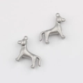 Close-up of matte silver 3D puppy charms with rings for DIY jewelry making - Gray