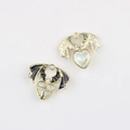 Detail view of heart-shaped bat wing charms with enamel and rhinestones for DIY jewelry - Gold Base Black