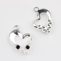 Close-up of heart-shaped alloy charms with pearl and zircon inlay for DIY jewelry - Silver Base Black Zirconia