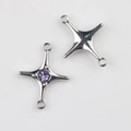Macro detail of silver star connectors with purple zircon for DIY jewelry making - Silver Purple Stone