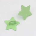 Detail of mint green star-shaped metal charms with horizontal texture for DIY crafts - Fruit Green
