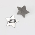 Detailed view of silver star alloy charms with textured surface and back loop - Silver