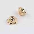 Close-up of golden tulip flower bead caps with polished finish for DIY jewelry making - Gold