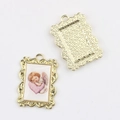 Macro view of vintage alloy angel pendant showing detailed baroque frame and matte back - Gold Base Heart Angel