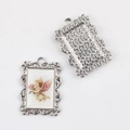Detailed view of silver alloy angel pendant showing both front artwork and back texture - Silver Base Flower Angel