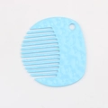Close-up of light blue alloy comb pendant featuring a unique hammered texture finish - Sky Blue