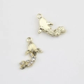 Detailed view of alloy koi fish pendants with gold plating and sparkling zircon inlay - Gold White Rhinestone