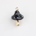 Detailed view of mushroom charm with black enamel and gold polka dots for jewelry - Black