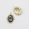 Front and back detail of vintage swan pendant with black enamel and pearl inlay - Gold Base Black