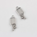 Close-up of silver alloy pickleball paddle pendants with textured mesh and small ball charm - Pickleball Paddle / Square Heart Silver