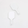 Close-up of white kitchen spoon with non-stick honeycomb texture and anti-slip handle - White Silver