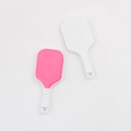 Close-up of pink and white tennis racket charms with unique honeycomb texture for DIY jewelry - White Base Rose Red
