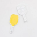 Detail showing colorful pickleball paddle charms with smooth and honeycomb textures - White Yellow