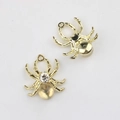Detail von Spinnenanhängern mit Goldbeschichtung, Strasssteinen und Harzperlen für DIY - Gold Weiß