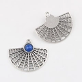 Macro detail of fan-shaped silver alloy pendants with blue resin stone for DIY jewelry - Sapphire Blue